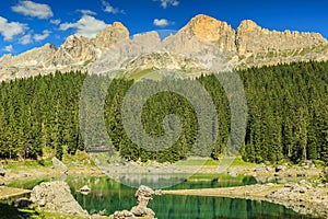 Famous lake of Carezza and Dolomites in background,Italy