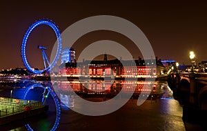Famous Landmark London Eye at Night and Reflection in Thames River