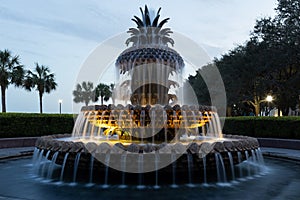 The famous landmark pineapple fountain in the Waterfront Park seen at dusk, Charleston