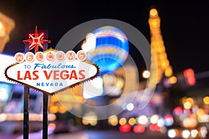 Famous Las Vegas sign with blur cityscape