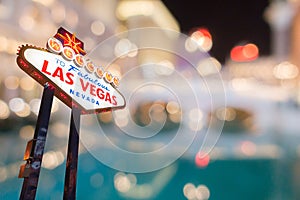 Famous Las Vegas sign with blur cityscape