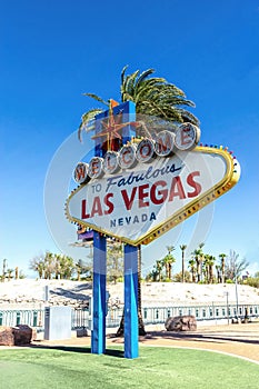The famous Las Vegas sign, with palm trees