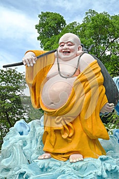 Jovial Laughing Buddha at Haw Par Villa, Singapore photo