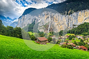 Famous Lauterbrunnen town and Staubbach waterfall,Bernese Oberland,Switzerland,Europe