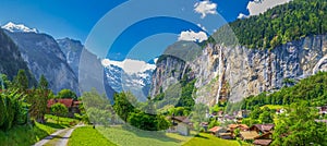 Famous Lauterbrunnen valley with gorgeous waterfall and Swiss Alps