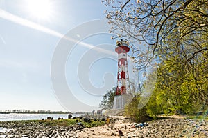 Famous lighthouse Leuchtturm Wittenbergen at the beach of the Elbe River in Hamburg, Germany