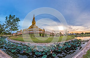 Famous Maha Mongkol Bua Pagoda in Roi-ed Thailand at sunset.