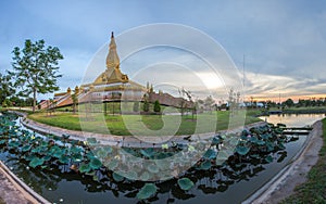 Famous Maha Mongkol Bua Pagoda in Roi-ed Thailand at sunset.