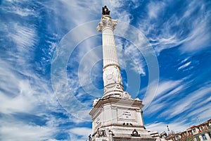 Famous marble column of Pedro IV in Rossio Square in Lisbon