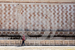 Famous mediaeval Fountain of 99 Spouts in ithe old town of L\'Aquila, Italy