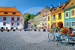 Famous medieval street cafe bar,Sighisoara,Transylvania,Romania,Europe