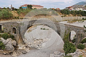 The famous Mesi bridge in Mes, Albania. photo