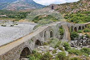 The famous Mesi bridge in Mes, Albania. photo