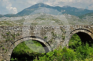 The famous Mesi bridge in Mes, Albania photo