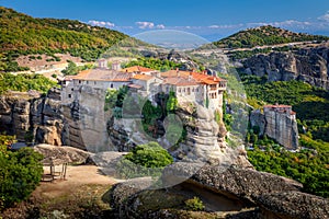 Famous Meteora monasteries. Panoramic view on the Holy Monastery of Varlaam placed on the edge of high rock. The Meteora area is