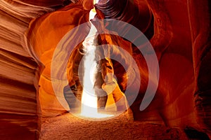 Famous midday sun ray in a slot canyon Antelope. The Navajo reservation, Arizona, USA