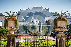 Famous Mirabell Gardens with historic fortress in Salzburg, Austria