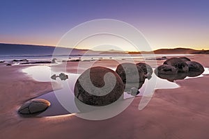 Famous Moeraki Boulders at low tide, Koekohe beach, New Zealand