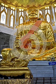 Famous monk statue cover by gold and have a name `Somdet Phra Buddhacharn` or Thai people call `Luang Phor Toh` in Wat Non Kum