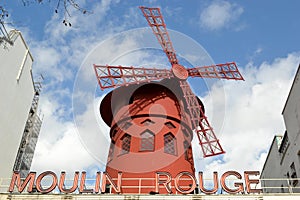 The famous Moulin Rouge cabaret in the lively Pigalle district on Boulevard de Clichy near Montmartre in Paris, France