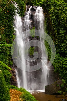 A famous Munduk Waterfall in a tropical jungle island of Bali, Indonesia