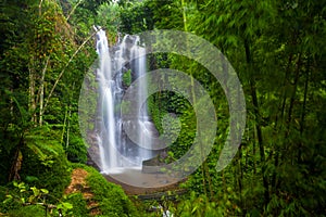 A famous Munduk Waterfall in a tropical jungle island of Bali, Indonesia