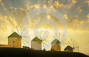 Famous Mykonos windmills in sunset