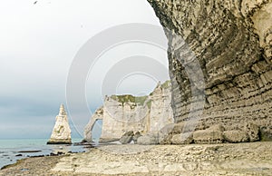 Famous natural cliffs in Etretat. Etretat is a commune in Seine-