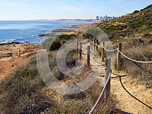Famous nature walkway path promenade of Cabo Roig. Costa Blanca. photo