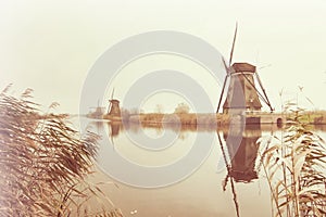 The Famous Netherlands wooden Windmills, UNESCO World Heritage Site, Kinderdijk Windmill village in the soft sunset light of