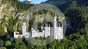 Famous Neuschwanstein Castle with scenic mountain landscape near Fussen, Bavaria, Germany. Neuschwanstein Castle in Hohenschwangau