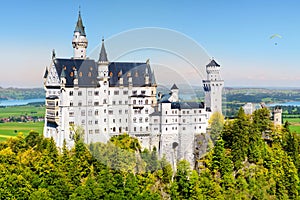 Famous Neuschwanstein Castle, fairy-tale palace on a rugged hill above the village of Hohenschwangau near Fussen