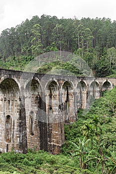 The famous nine-arch bridge of the railway in the jungle in Sri Lanka