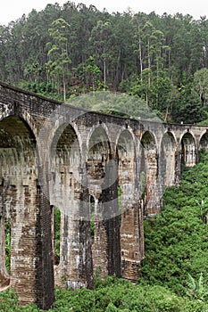 The famous nine-arch bridge of the railway in the jungle in Sri Lanka