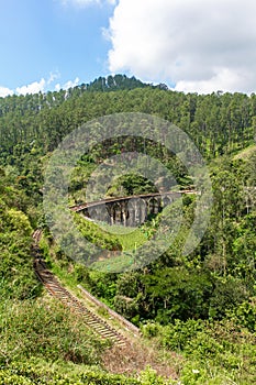 The famous nine-arch bridge of the railway in the jungle in Sri Lanka