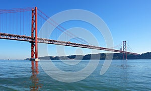 Famous old bridge over river Tejo photo