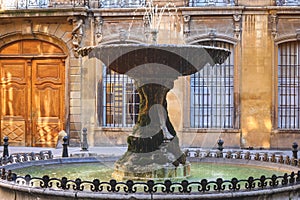 Old fountain popular landmark in Aix en Provence