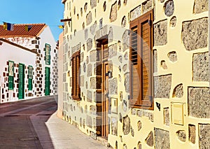 Famous old town of Aguimes. Street with typical old colorful canarian houses. photo