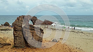 Famous Pedra Furada natural rock arch in Jericoacoara beach, Brazil