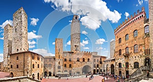 Famous Piazza del Duomo in historic San Gimignano, Tuscany, Italy