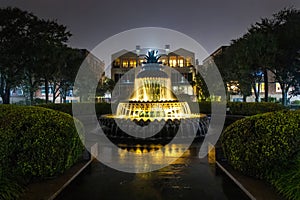 Famous Pineapple Fountain illuminated at night in Charleston