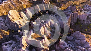 Famous Pink Valley At Sunset, Gulludere in Cappadocia, Turkey. Colourful Mountains, Aerial drone landscape. Red and Pink