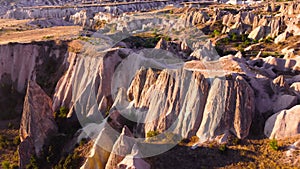 Famous Pink Valley At Sunset, Gulludere in Cappadocia, Turkey. Colourful Mountains, Birds eye view 4k aerial drone
