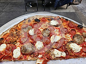 Famous Pizza place in the Italian district of san francisco california referred to as Tony& x27;s pizza