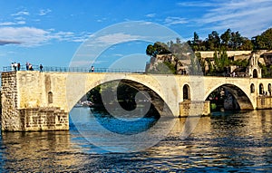 Famous Pont dÂ´ Avignon over Rhone River Saint Benezet Bridge at sunset. Avignon, Provence, France