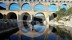 Famous Pont du Gard at sunset, old roman aqueduct in France