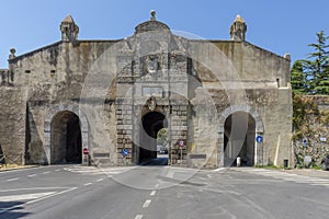 The famous Porta Nuova and the ancient walls of Orbetello, Grosseto, Italy, in the historic center on a sunny day