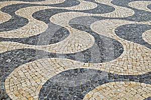 Famous Portuguese cobblestone hand-made street pavement