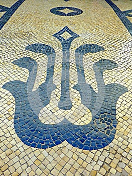 Famous Portuguese mosaic sidewalk CalÃ§ada Portuguesa in Lisbon photo