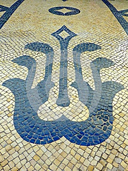 Famous Portuguese mosaic sidewalk Calçada Portuguesa in Lisbon